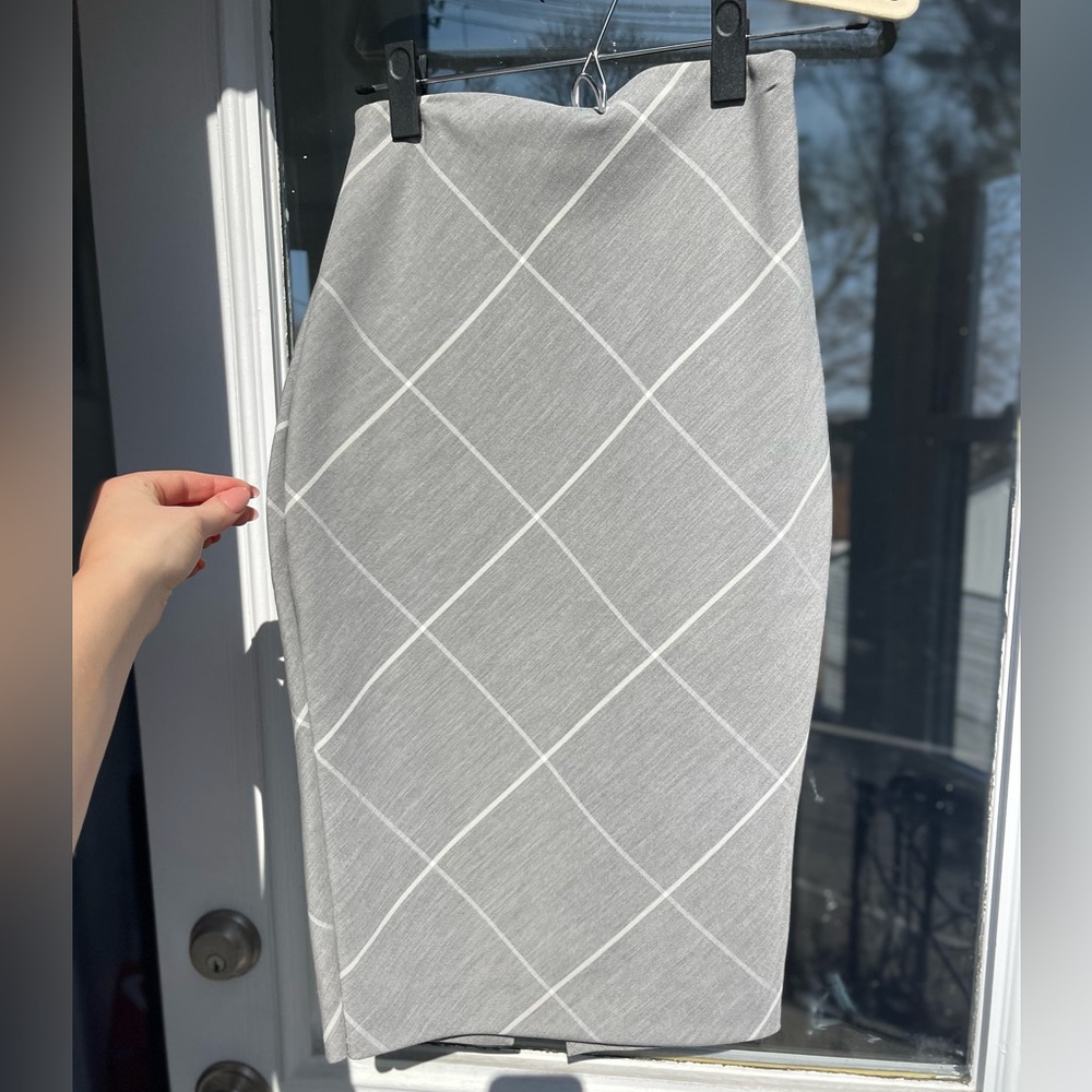 Knee length pencil skirt with back slit